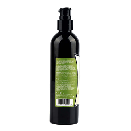 Miracle Oil Tea Tree Shave Cream 8 Oz bottle back view with pump and label details.