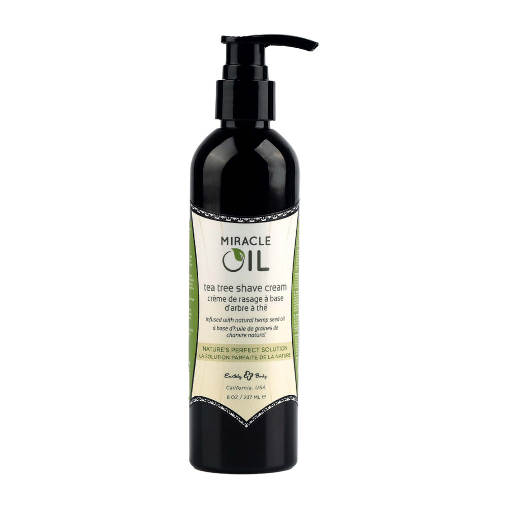 Miracle Oil Tea Tree Shave Cream 8 Oz in a black pump bottle for smooth shaving and moisturizing skin protection.