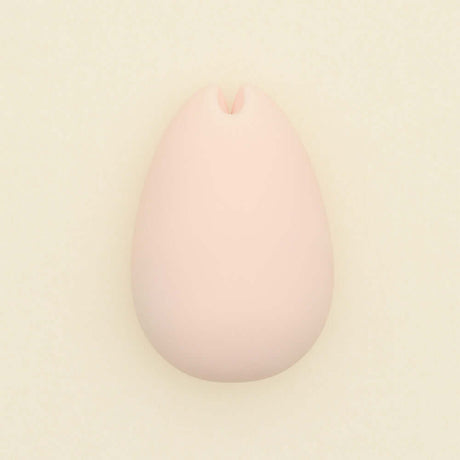 Tenga iroha SAKURA Massager in soft cherry-blossom pink color for soothing self-pleasure.