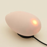 Tenga iroha SAKURA Massager with a soft pink design and gentle lighting feature.
