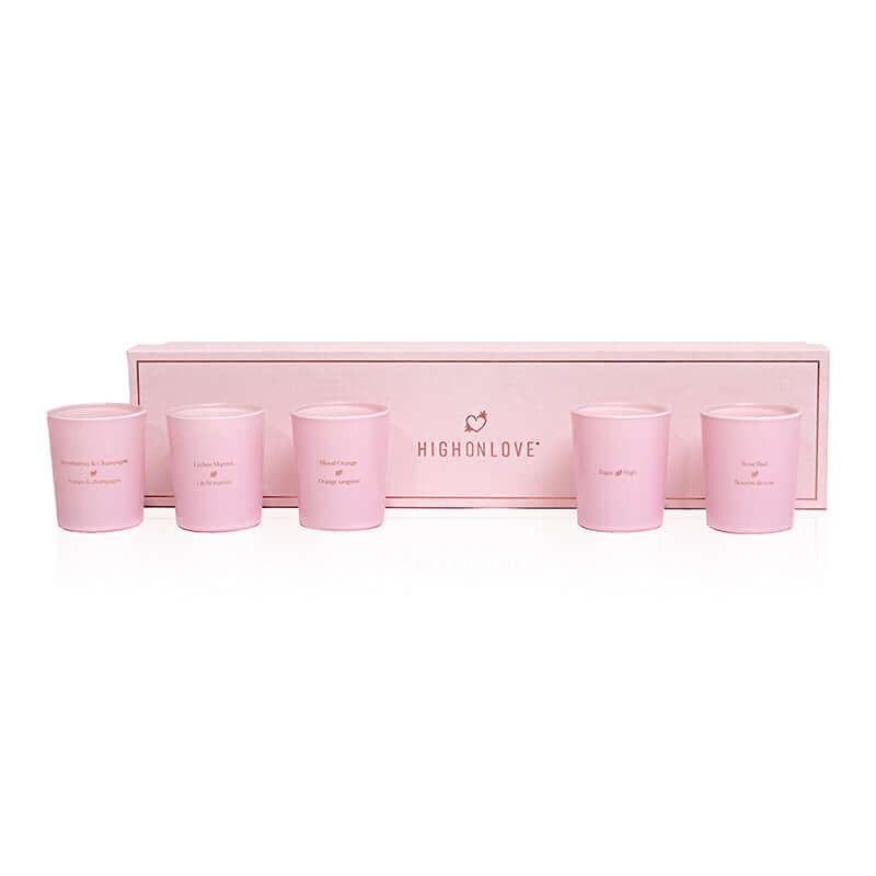 HighOnLove Mini Sensual Massage Candles Collection in elegant pink packaging with five unique candles.