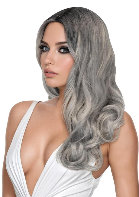 Celeste Premium Stylable Wig Silver modeled by a woman, showcasing elegant silver and ash tones in soft waves.