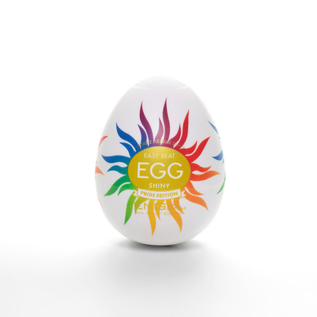 Tenga Egg Shiny II Pride Edition with vibrant sunburst design celebrating pleasure and pride