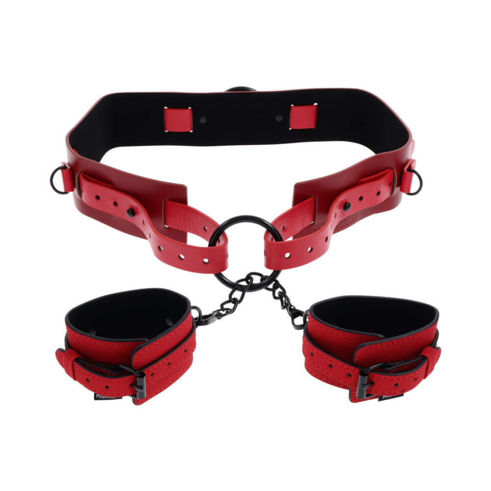 Sex & Mischief Exs & Ohs Bound and Belted restraint featuring red faux leather with adjustable cuffs.