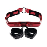 Sex & Mischief Exs & Ohs Bound and Belted bondage restraint with red belt and black cuffs.