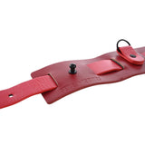 Sex & Mischief Exs & Ohs Bound and Belted in durable faux leather with red accents for versatile bondage.