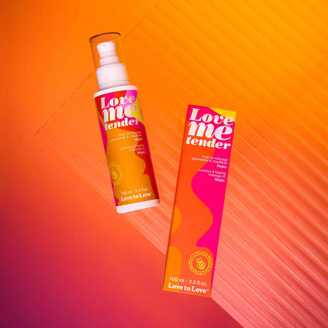 Love Me Tender Luscious & Heating Massage Oil Mojito 3.3 Oz with colorful packaging and pump bottle.