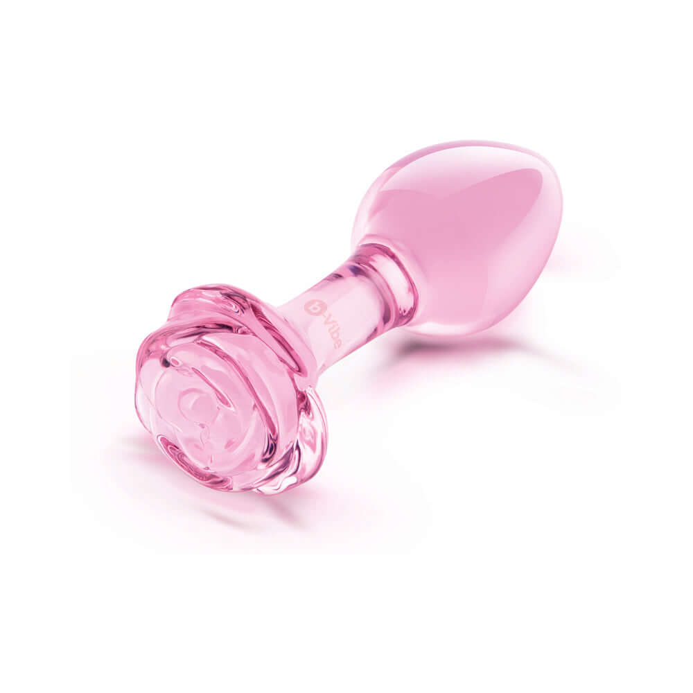 b-Vibe Glass Pink Roses Training Plug Set featuring a sleek pink glass butt plug with a rose-detailed base.