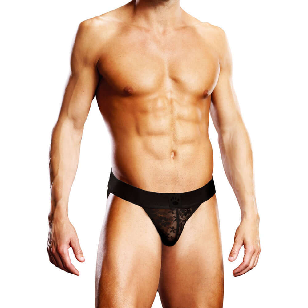Prowler Lace Jock Strap Black Medium worn by a model showcasing its revealing design and comfortable fit.
