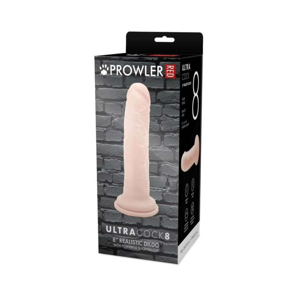 Prowler RED Ultra Cock 8 inch Realistic Dildo Vanilla packaging on display against a brick background.