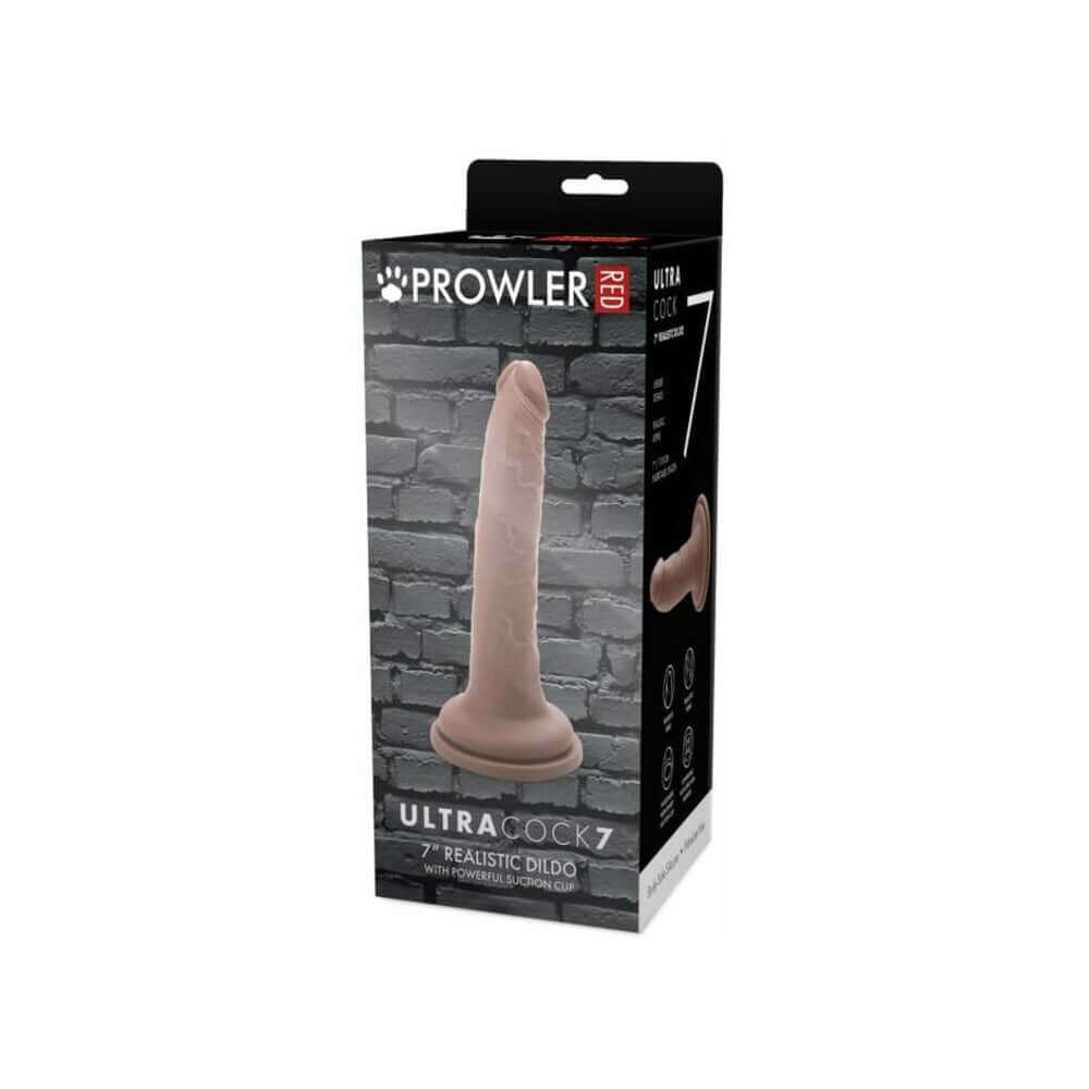 Prowler RED Ultra Cock 7 inch Realistic Dildo Caramel in packaging against a textured wall background.