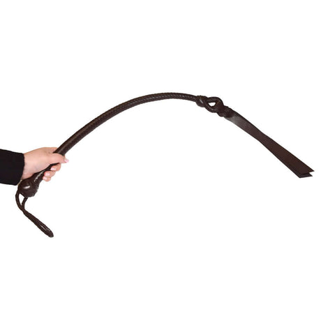 Prowler RED Leather Whip Brown held in hand for impact play showcasing its premium leather quality and craftsmanship.