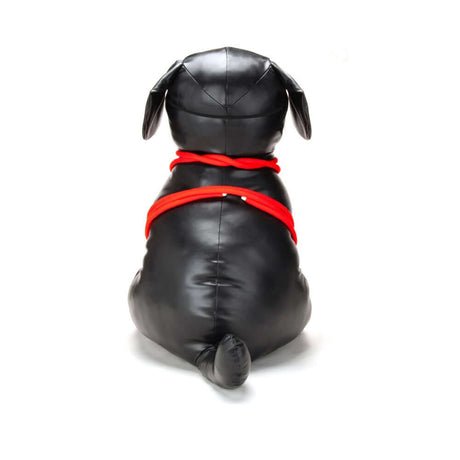 Prowler RED Roped Up Rover L black faux leather harness with red ropes on a dog figure from behind.