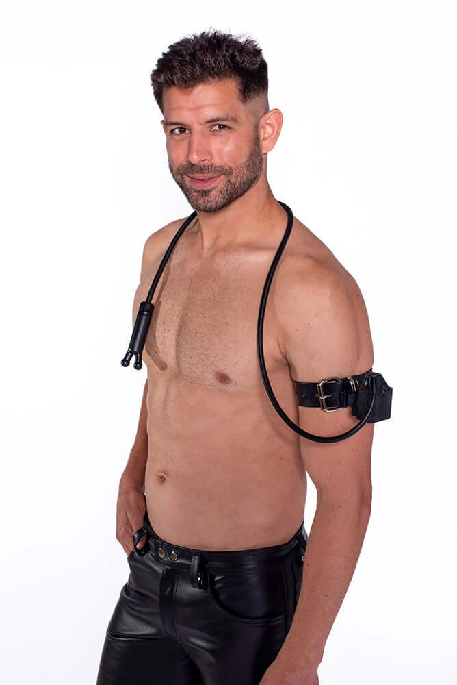 Prowler RED Toppers The Kit Black displayed by a model wearing black leather, showcasing versatility for intimate play.