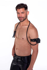 Prowler RED Toppers The Kit Black displayed by a model wearing black leather, showcasing versatility for intimate play.