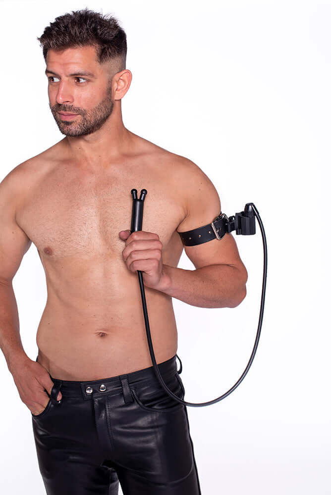 A model showcases the Prowler RED Toppers The Kit Black, featuring a stylish black harness.