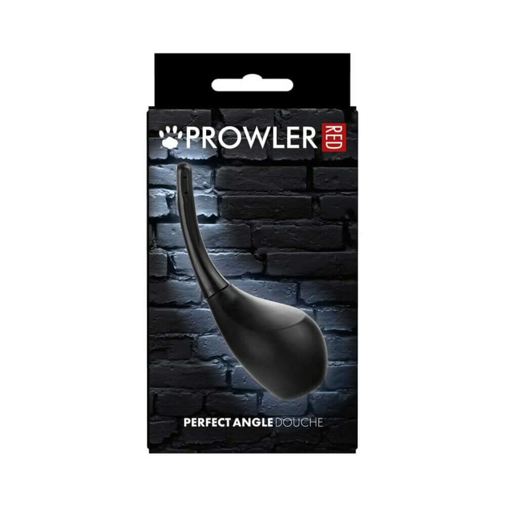 Prowler RED Perfect Angle Douche Black in packaging against a brick background, showcasing its ergonomic design and angled nozzle.