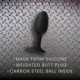 Prowler RED Weighted Butt Plug Black Medium on metallic background with information about material and features.