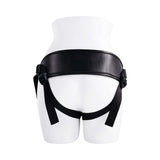 Evolved Giving Vibes Strap On Purple displayed on a mannequin with black harness and straps for strap-on play.