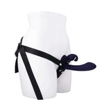 Evolved Giving Vibes Strap On Purple showcasing its design with a chisel-tip shaft and bunny-eared stimulator.