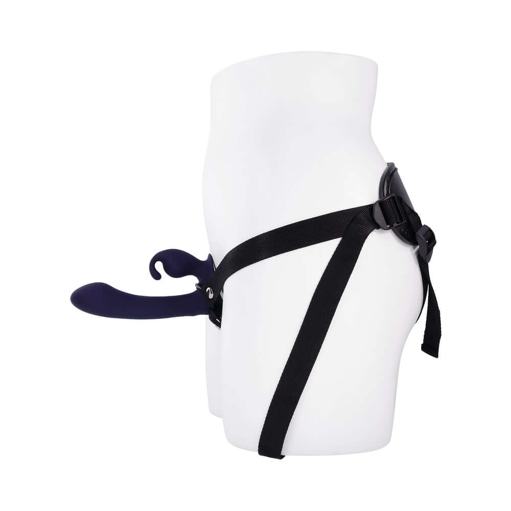 Evolved Giving Vibes Strap On Purple displayed on a mannequin, showcasing its unique design and adjustable straps.