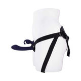 Evolved Giving Vibes Strap On Purple displayed on a mannequin, showcasing its unique design and adjustable straps.