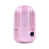 Evolved Vacation Vibes Vibrating Massager Pink Black in a shiny pink canister with a textured lid.