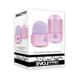 Evolved Vacation Vibes Tapping Massager packaging showcasing its pink design and rechargeable features.
