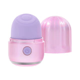 Evolved Vacation Vibes Tapping Massager in pink-pearl with purple top, travel-friendly design, ideal for discreet pleasure.