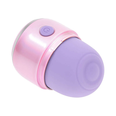 Evolved Vacation Vibes Tapping Massager in pink and purple, compact design for rhythmic tapping sensations.