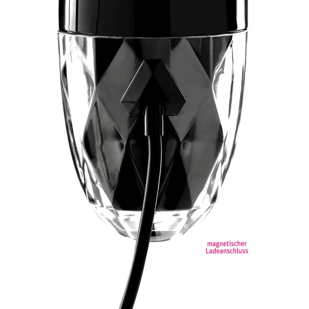 Mystim Right on Ron E-Stim Vibrator Black charging connection detail with a magnetic plug.