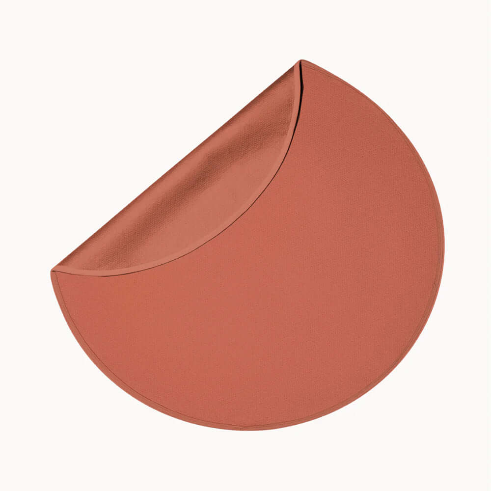 Dame Thro Waterproof Sex Blanket Copper in a circular shape with a modern design, highlighting its soft texture.