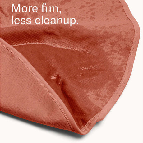 Dame Thro Waterproof Sex Blanket Copper showcasing its soft texture and waterproof design for easy cleanup.