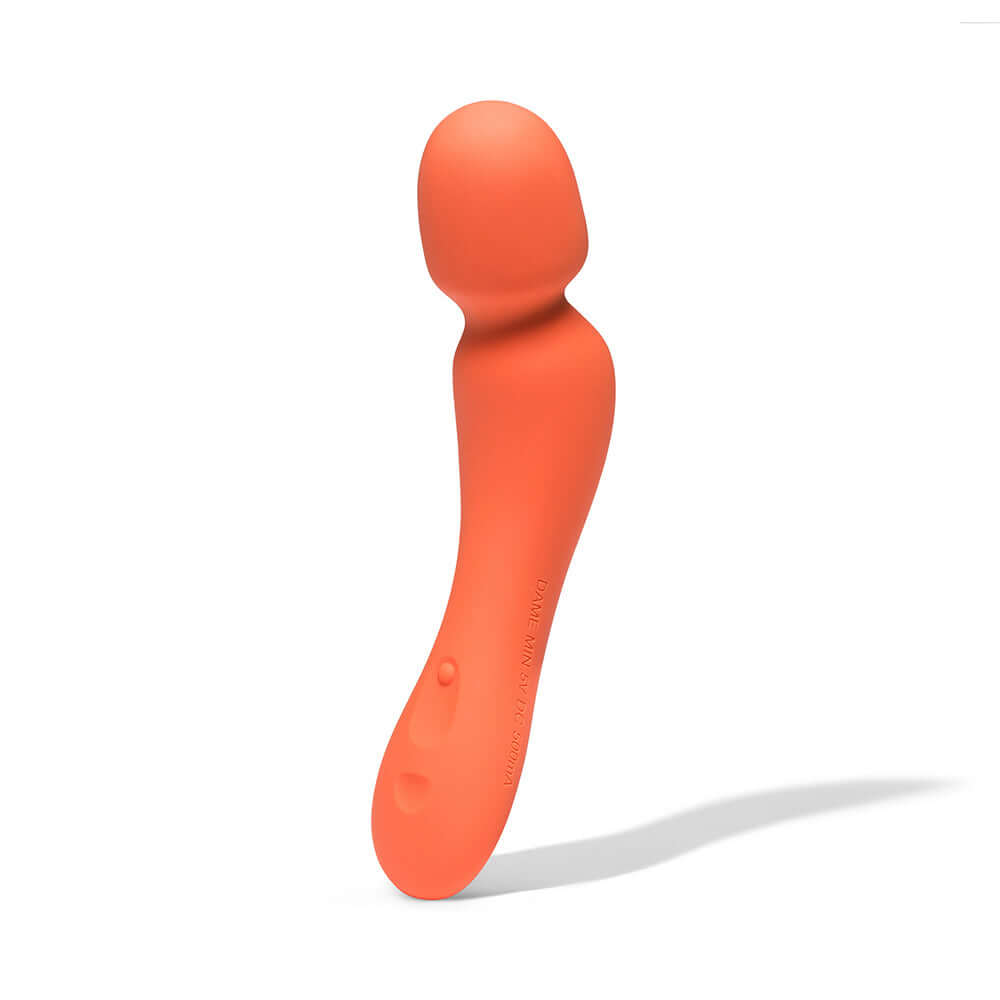 Dame Min Mini Wand Vibrator Papaya in smooth silicone design, ideal for intimate pleasure and travel.