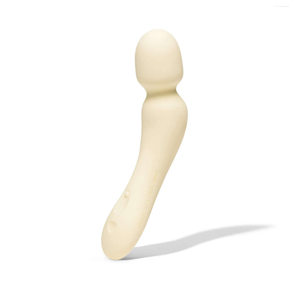 Dame Min Mini Wand Vibrator Butter in beige, showcasing its sleek silicone design and compact form.