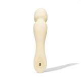 Dame Min Mini Wand Vibrator Butter in a soft ivory color showcasing its sleek design and silicone head.