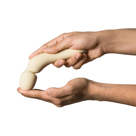 Dame Min Mini Wand Vibrator Butter held in hand, showcasing its compact design and smooth finish.