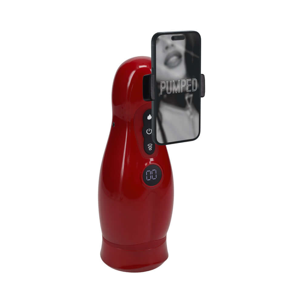 PUMPED Virtuo Masturbator Suction Vibration Phone Attachment in red with phone holder for enhanced stimulation.
