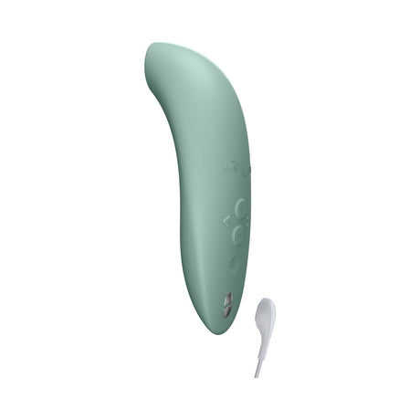 We-Vibe Melt 2 Pleasure Air Clitoral Stimulator Sage in sage green color with charging cord.