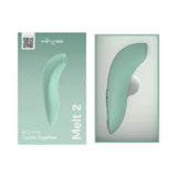 We-Vibe Melt 2 Pleasure Air Clitoral Stimulator Sage packaging in mint green, showcasing the sleek design and features.