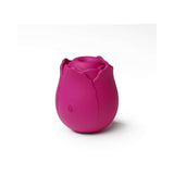 INYA The Vibrating Rose Red, a sculpted pleasure device resembling a rose, in vibrant pink color.