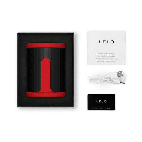 LELO F2S Massager and Stroker Red in packaging with user manual and USB charging cable.