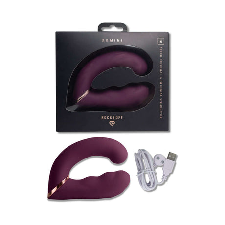 Rocks-Off Gemini Dual Stimulator Burgundy in packaging with charging cable for dual-motor stimulation.