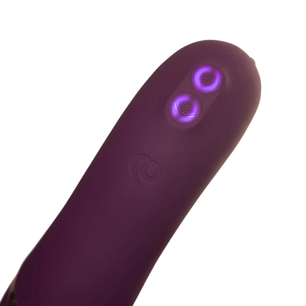 Rocks-Off Gemini Dual Stimulator Burgundy close-up showing dual-motor controls and sleek design.