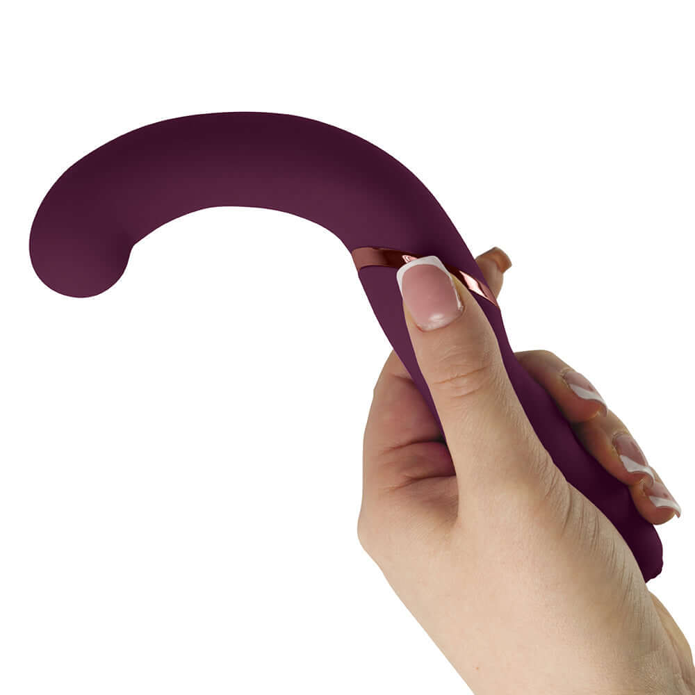 Rocks-Off Gemini Dual Stimulator Burgundy held in hand, showcasing its ergonomic design for dual stimulation.