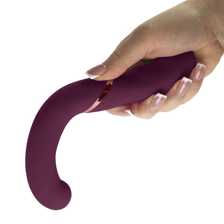Rocks-Off Gemini Dual Stimulator Burgundy held in hand, showcasing its ergonomic design and soft silicone material.
