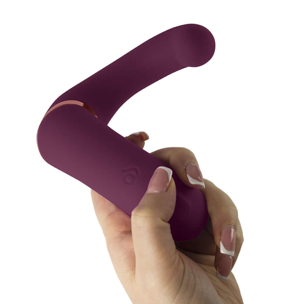 Rocks-Off Gemini Dual Stimulator Burgundy held in hand showcasing its ergonomic design and dual stimulation features.