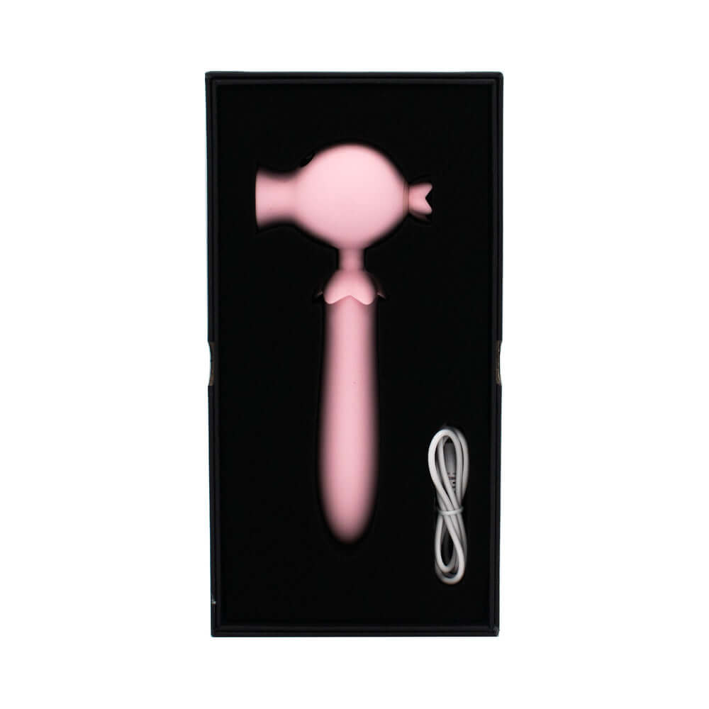 Lick n Stick Clit Flicker & G-Spot Vibrator in black box with white charging cable.