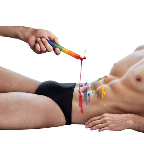 Master Series Pride Candles Rainbow Drip Candle Set of 3 being used to create body art with vibrant colors on skin.