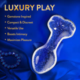 Oh My Gem Prestige Glass Anal Plug Blue on a blue backdrop, showcasing gemstone-inspired design and luxurious features.